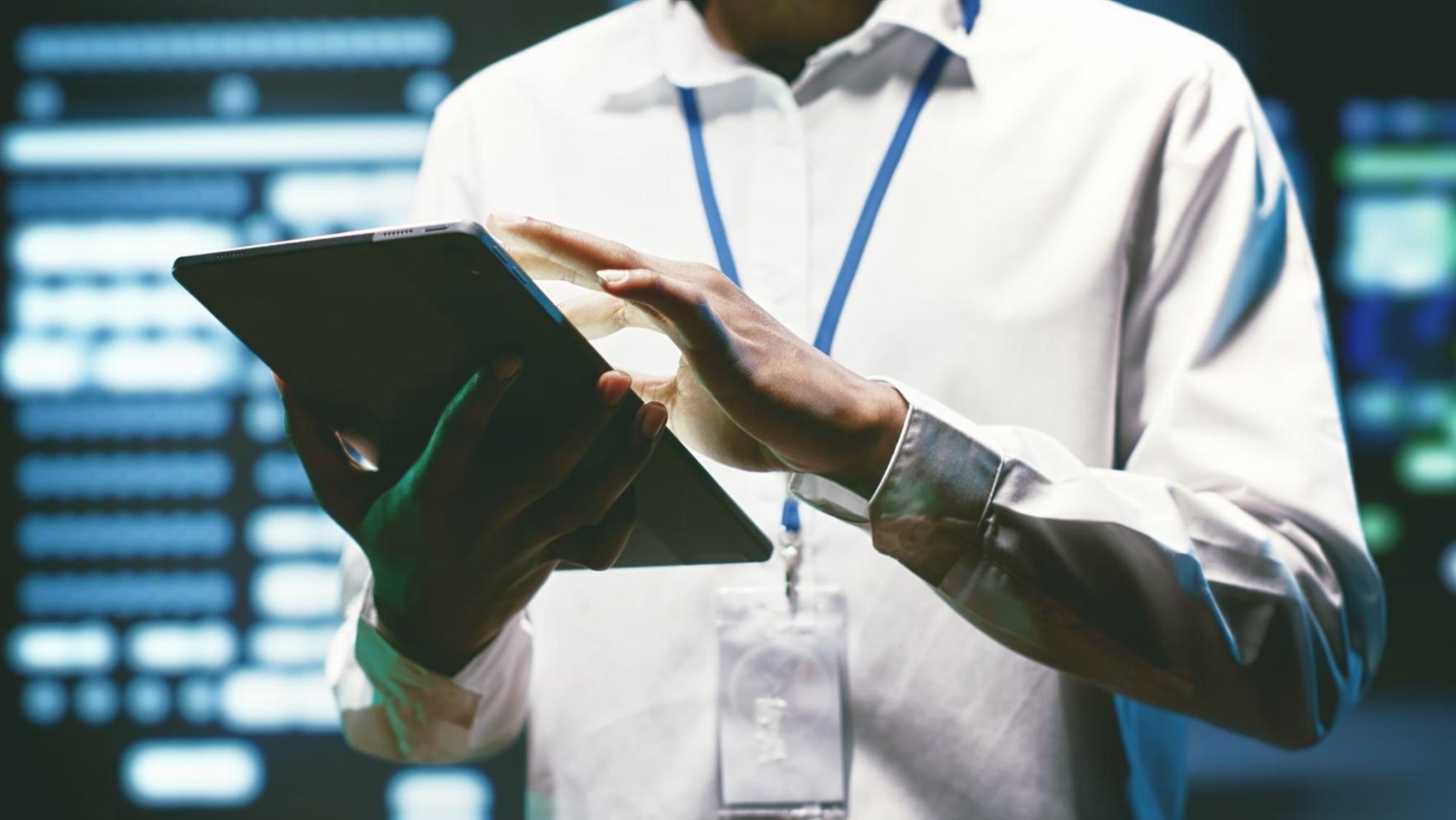 Students collaborating on web design projects in modern workspace